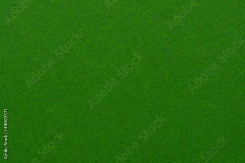 Dark green background with a fleecy base. photo