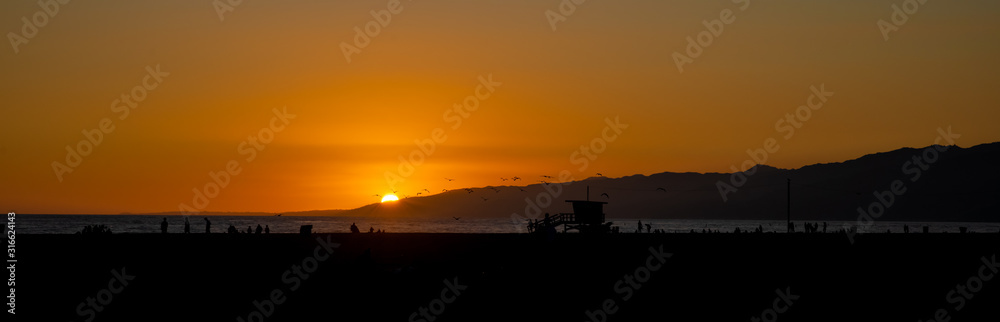 Panoramic view of Santa Monica beach in Los Angeles at sunset