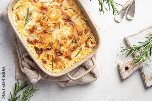 potato casserole with cream, gratin dauphinois, french cuisine photo