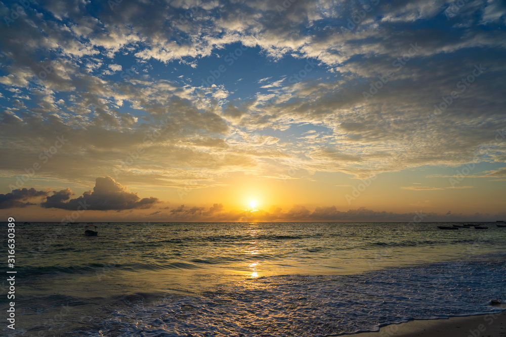 Sunrise over the Indian Ocean on the island of Zanzibar, Tanzania, Africa