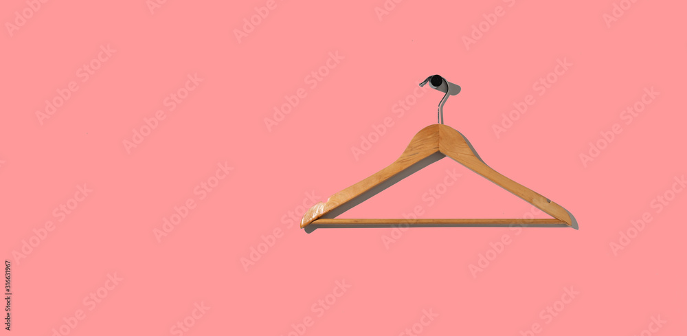 a simple empty clothes hanger on the wall hook, fashion cloth textile storage a simple empty clothes hanger on the wall hook, fashion cloth textile storage