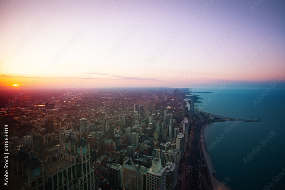 Obraz premium Chicago downtown panorama at sunset dusk with Concrete beach on Michigan and interstate 41 highway