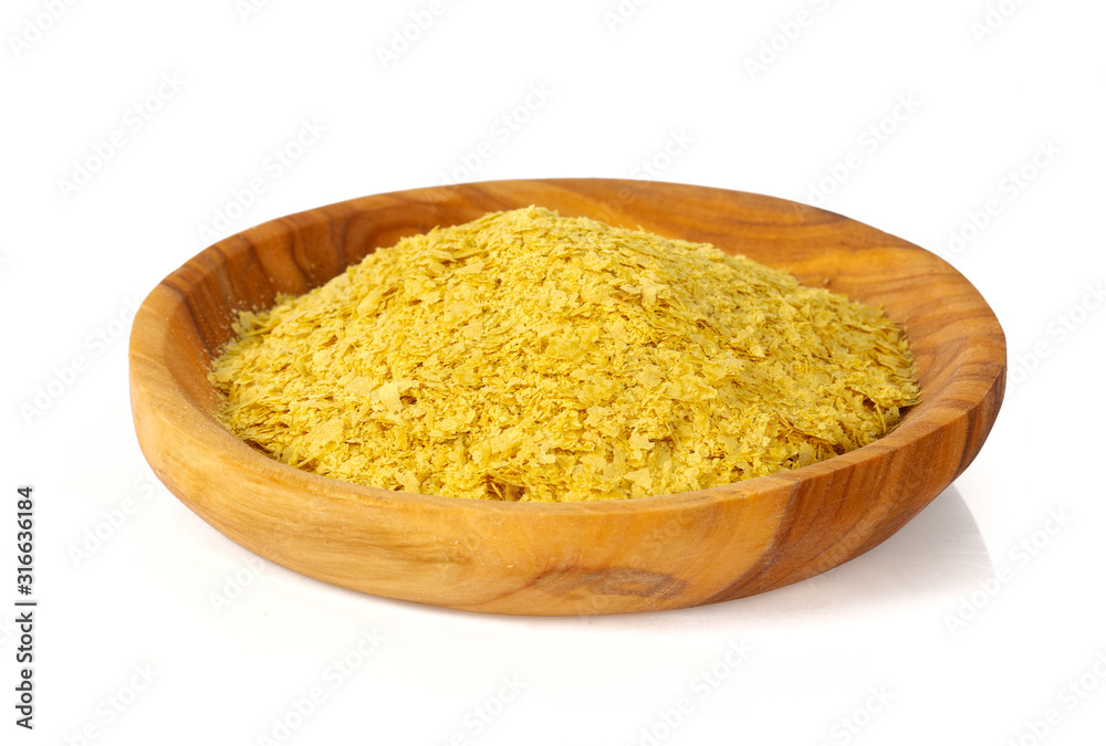 nutritional yeast flakes isolated on white background nutritional yeast flakes isolated on white background