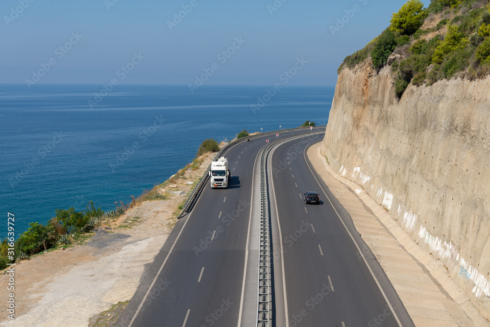 Turkish сoastal highway along the sea below the steep cliff fixed