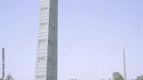 Tilt up from base to top of the Rome Stele Number 2 rear angled view at the Northern Stelae Field in Aksum, Ethiopia