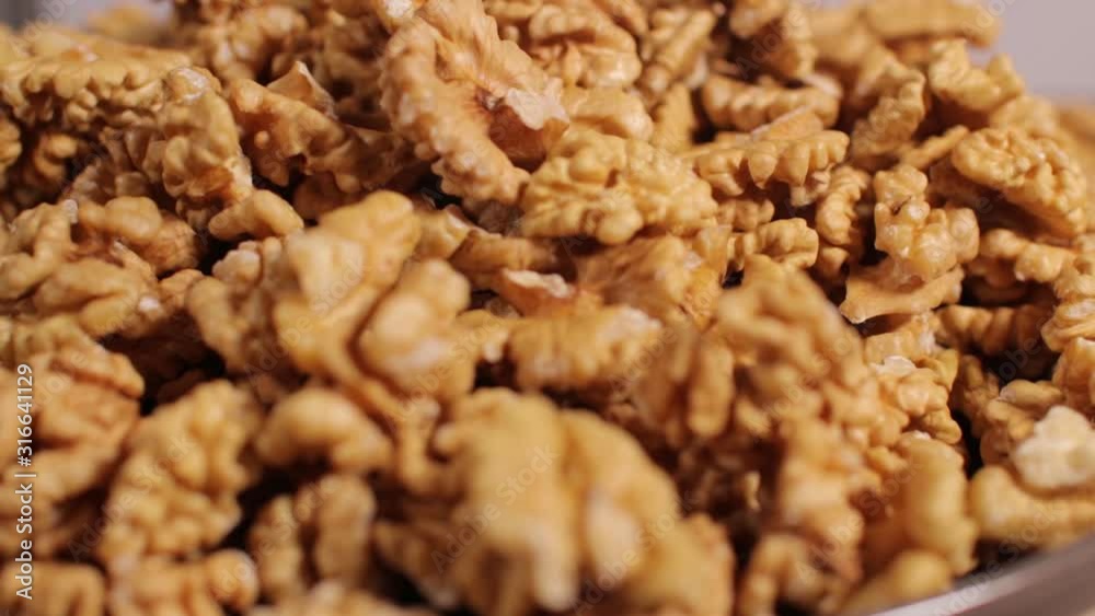 Rotating Walnut kernels close up 
