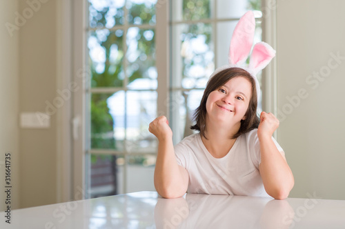 Photography Down syndrome woman at home wearing easter rabbit ears screaming proud and celeb