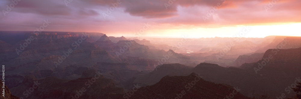 Fototapeta premium This is the south rim of the Grand Canyon known as Grand View Point. Also in view is the Colorado River at sunrise.