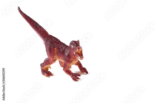 Toy dinosaurs isolated on white background.Copy space © finchmaystor