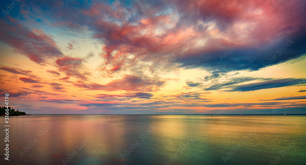 Dramatic Sunset Clouds over the Ocean Horizon