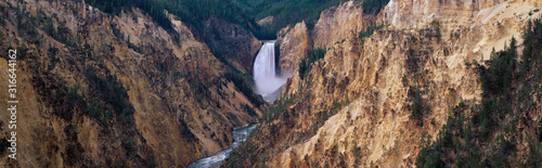This is the Grand Canyon of Yellowstone. In the center are the Lower Falls and Yellowstone River. It is the view from Artist Point.
