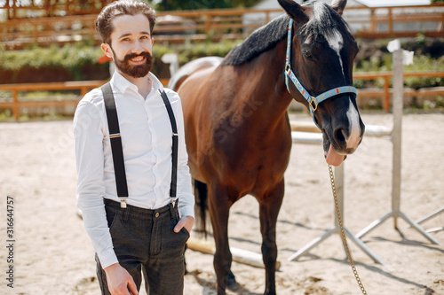Horse theme. Businessman with a horse. Man in a suit