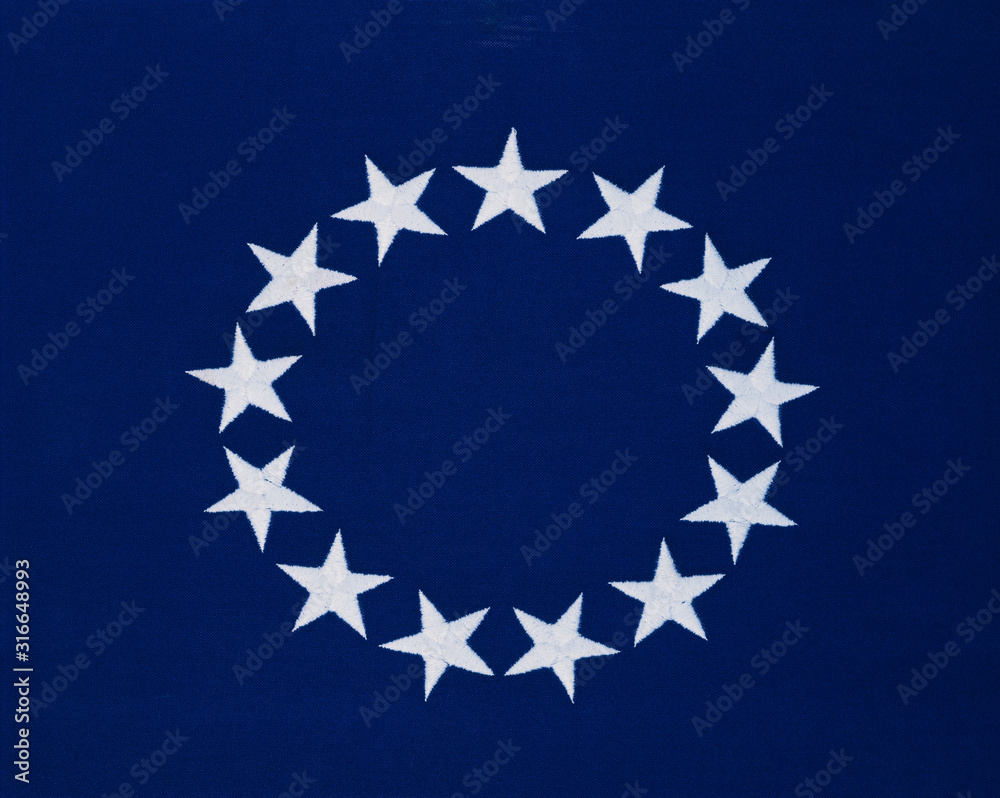 This is a flag with 13 stars sewn in a circle in a field of blue. This was the Original Colonial Flag from the Revolutionary War. - obrazy, fototapety, plakaty 