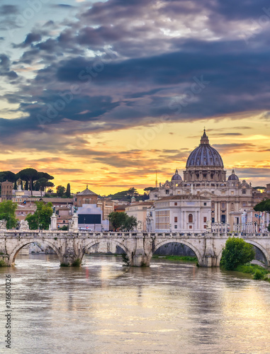 A view along the Tiber River towards St. Peter's Basilica and the Vatican in Rome, Italy. © Jbyard