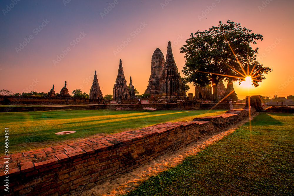 Background of Wat Chai Watthanaram in Phra Nakhon Si Ayutthaya province, tourists are always fond of taking pictures and making merit during holidays in Thailand.