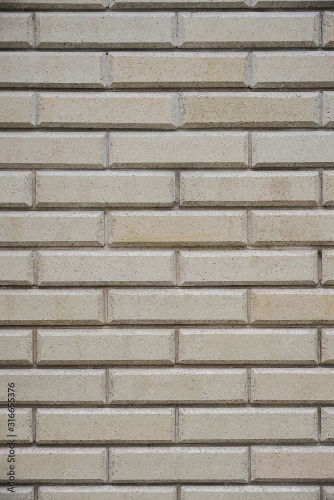 gray yellow brick wall background in outside, vertical stock photo image gray yellow brick wall background in outside, vertical stock photo image