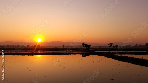 Reflection of sunrise, Landscape view in the morning at Chaing Rai Thailand.