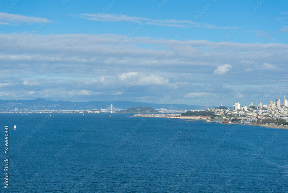 View of San Francisco Bay and cityscape from Golden Gate Bridge.