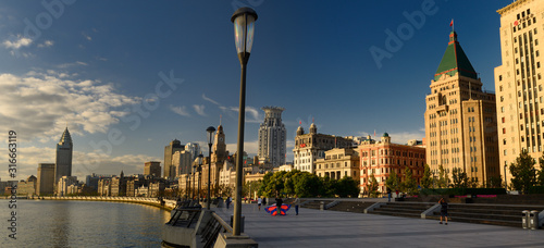 Panorama of early morning looking south on the Bund at Huangpo River Shanghai China photo