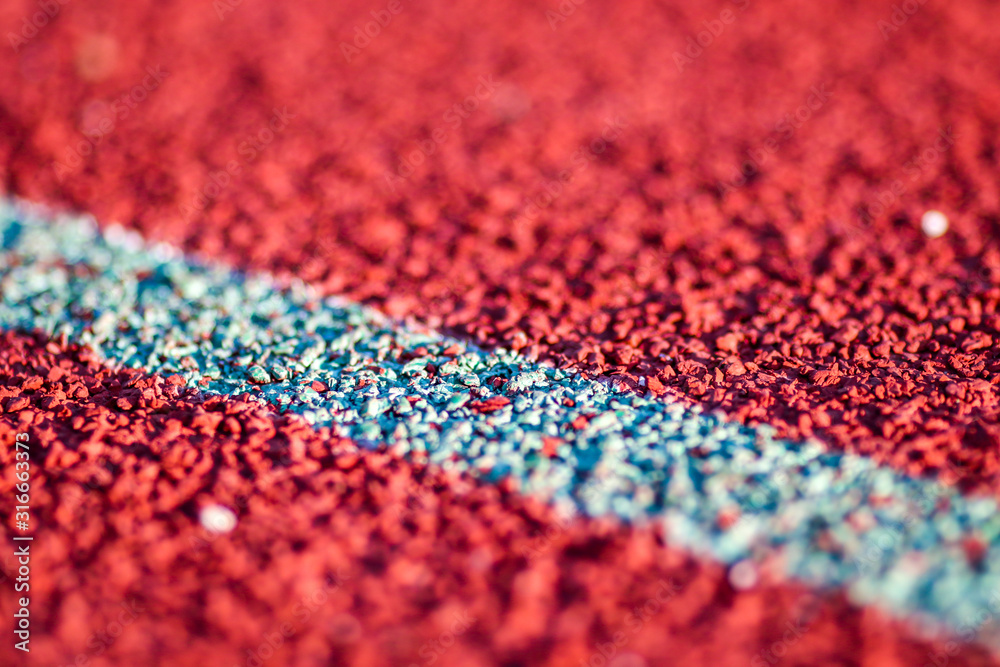 Red running sport track background and texture. Sport running track concept.