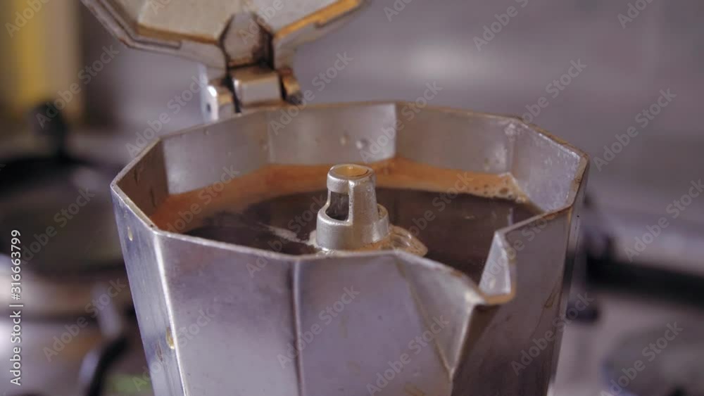 extreme close up italian coffee maker boiling extreme close up italian coffee maker boiling