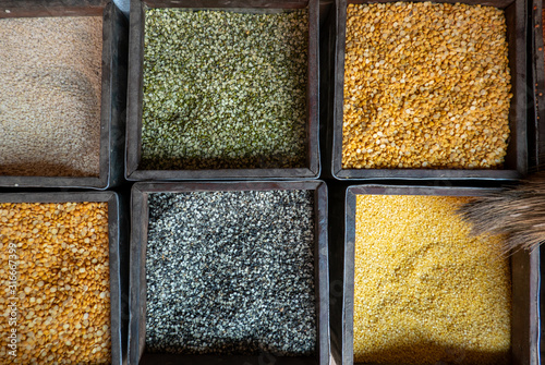 Bins of Different Kinds of Lentils for Sale photo