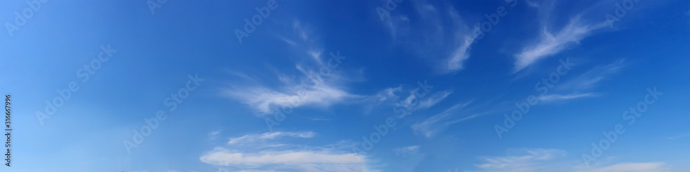 Panorama sky with cloud on a sunny day. Beautiful cirrus cloud. Panoramic image.