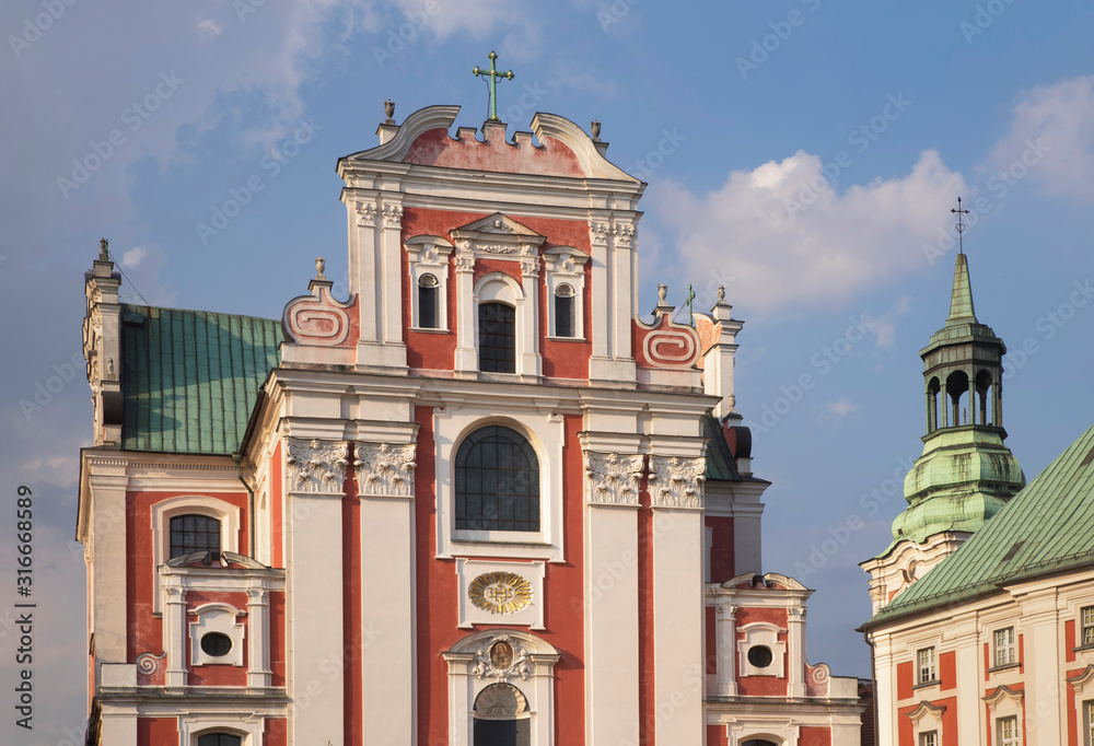 Obraz premium Collegiate church of Our Lady of Perpetual Help, Saint. Mary Magdalene and St. Stanisław Bishop (Poznan Fara) and Jesuits collegium in Poznan. Poland