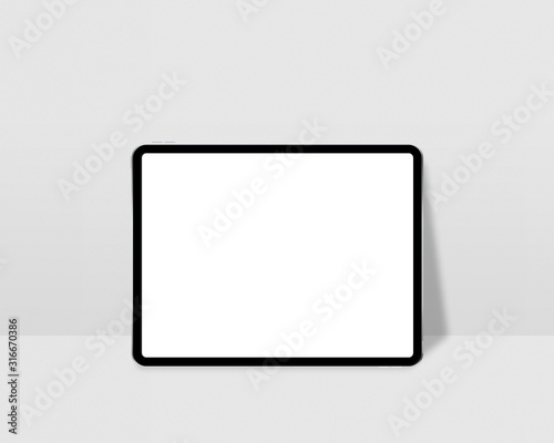 Digital tablet with empty screen. Tablet mockup on minimal background. Modern tablet display mockup scene. Photo mockup with clipping path.