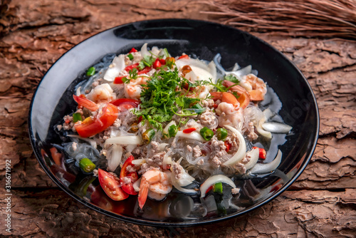 Thai salad with carrot, tomato, glass noodle, celery and pork,