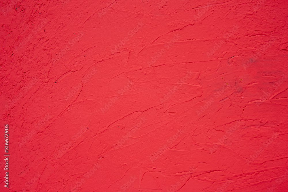 The red background of the wall,Textured background and red lighting
