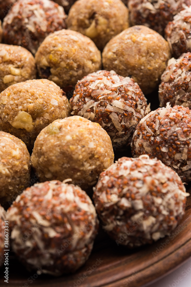 Group of Dink, Gond , Aliv, Halim laddu, Laddoo, Ladu, Ladoo Made using Garden cress Seed and edible gum, sweet food Group of Dink, Gond , Aliv, Halim laddu, Laddoo, Ladu, Ladoo Made using Garden cress Seed and edible gum, sweet food