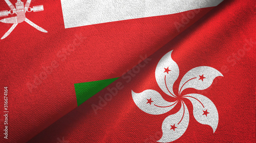 Oman and Hong Kong two flags textile cloth, fabric texture photo