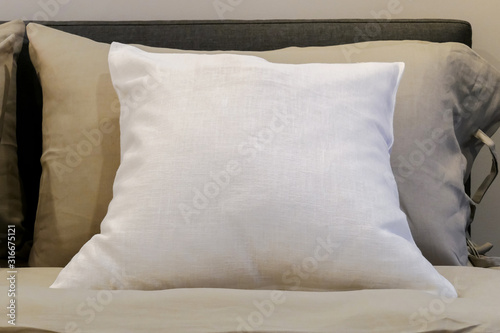 white soft pillows on the comfortable bed