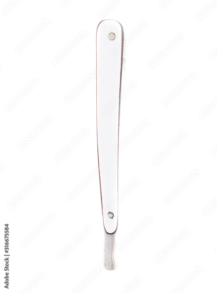 Dangerous razor for cutting hair isolated on a white background