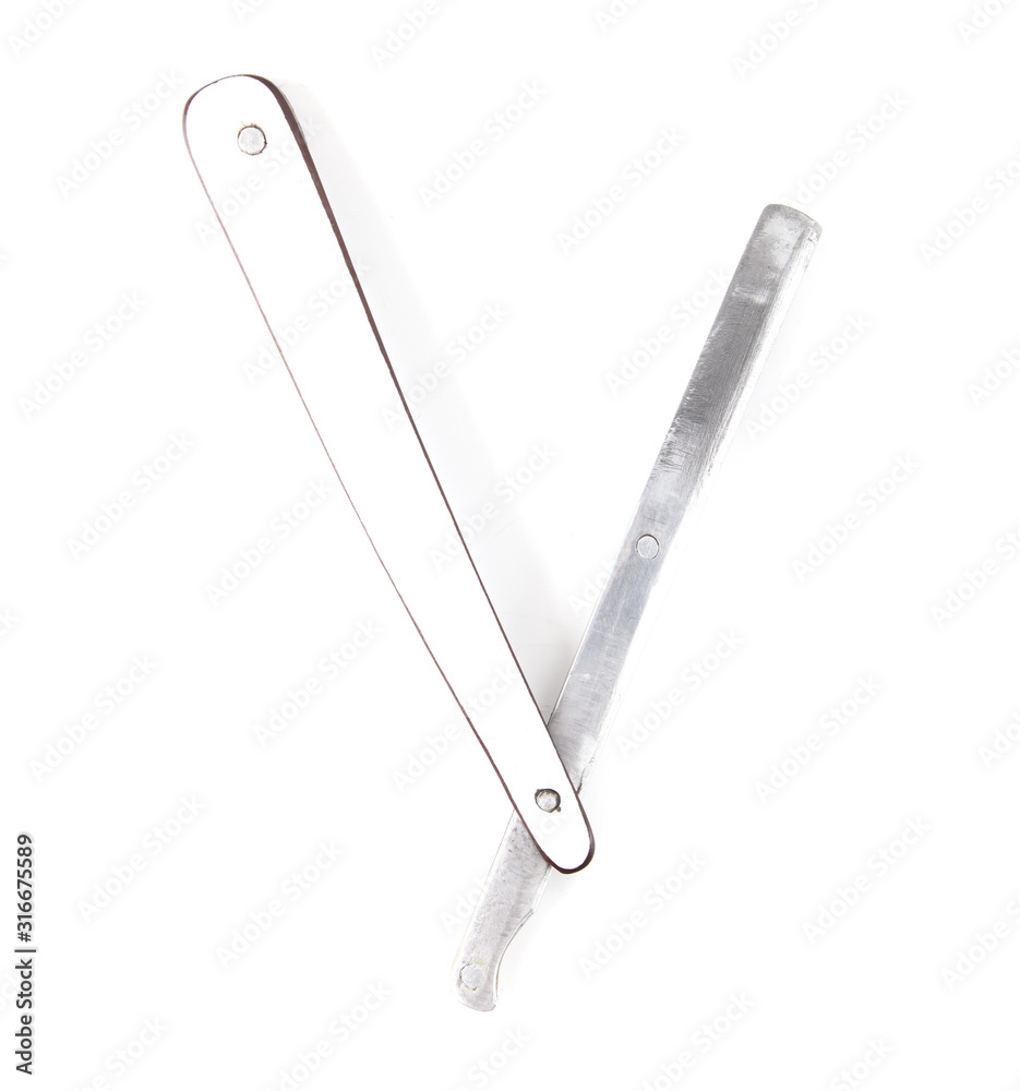 Dangerous razor for cutting hair isolated on a white background Dangerous razor for cutting hair isolated on a white background
