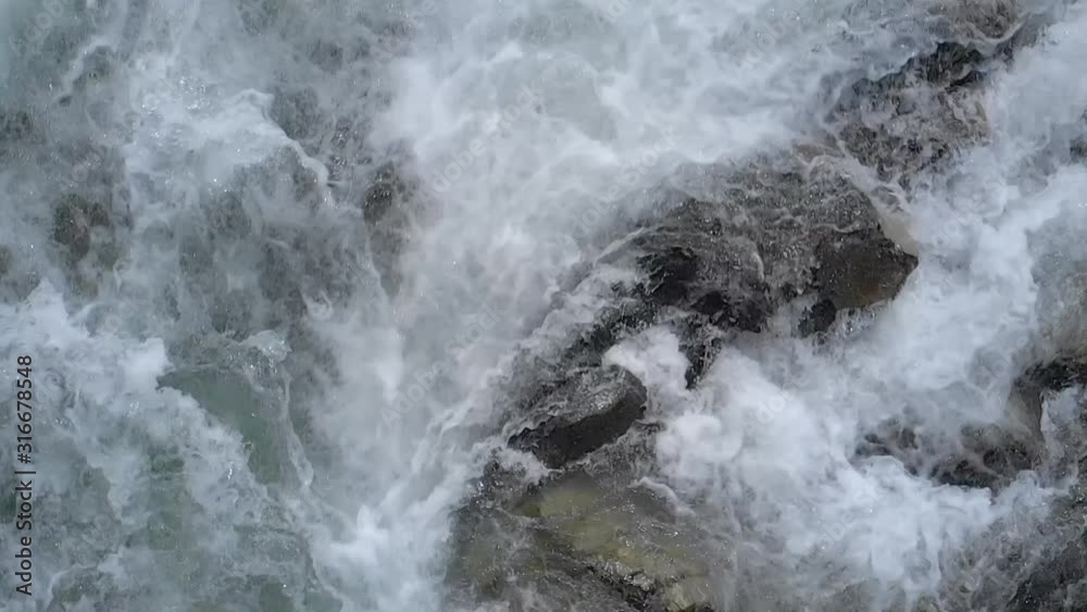 Mountain river water, top view. Crystal clear mountain river. Beautiful nature lansdscape.
