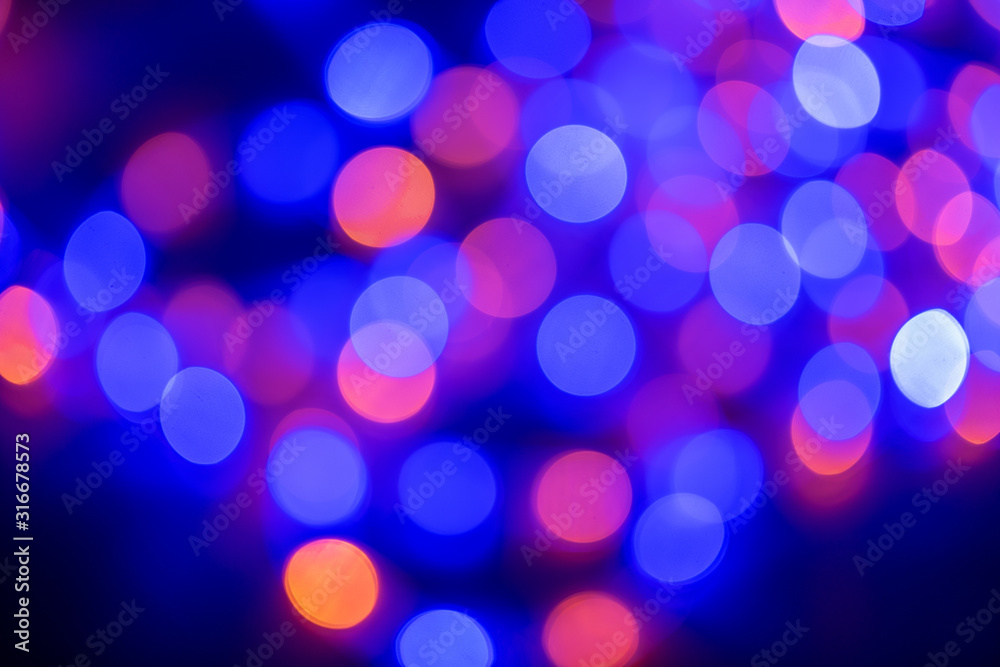 Defocused bright lights shining in dark