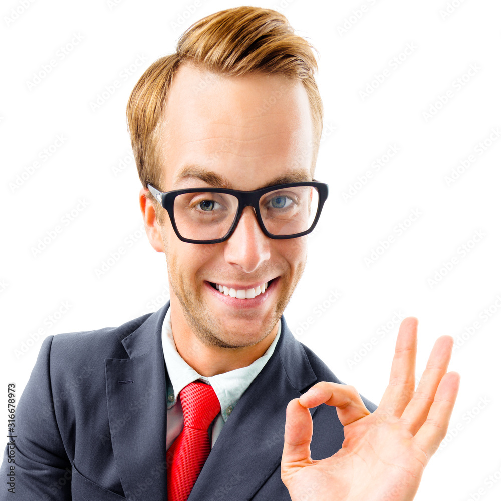 OK! Funny happy excited businessman in glasses showing ok gesture or zero, confident suit and red tie, isolated over white background. Business concept square composition picture. OK! Funny happy excited businessman in glasses showing ok gesture or zero, confident suit and red tie, isolated over white background. Business concept square composition picture.