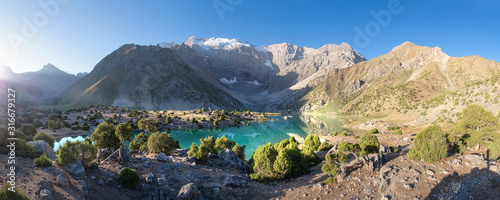 Obraz na płótnie Beautiful scenery of mountain lake. Kulikalon lake in Fann Mountains, Tajikistan. Sunrise in summer day w salonie