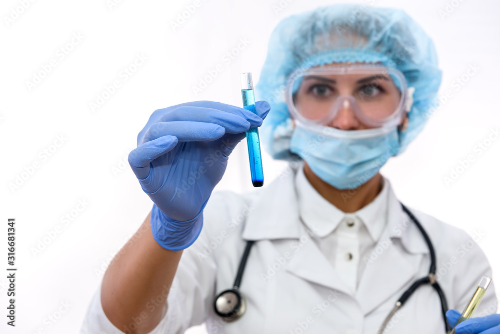 Scientist in protective uniform with flask isolated on white Scientist in protective uniform with flask isolated on white
