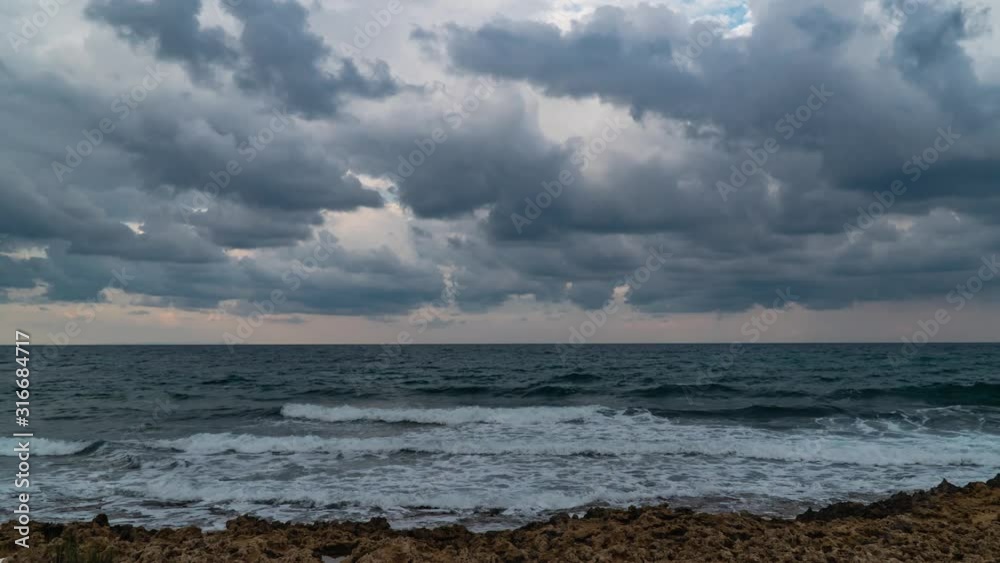 Time lapse of rain clouds moving over the sea. Clouds before a thunderstorm. 4K Time lapse of rain clouds moving over the sea. Clouds before a thunderstorm. 4K