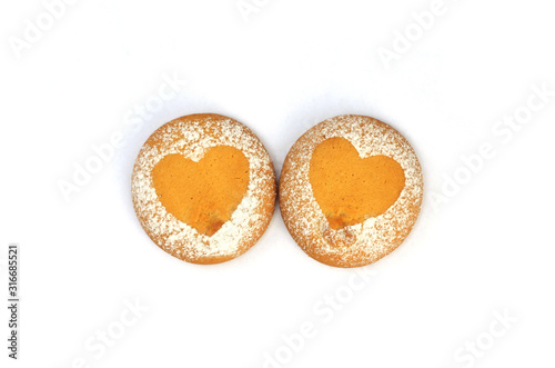 Heart shaped round cookie with icing sugar pattern on white isolated background. Valentine's day stock photo with place for text. For web, print, holiday cards, invitations, wallpapers.