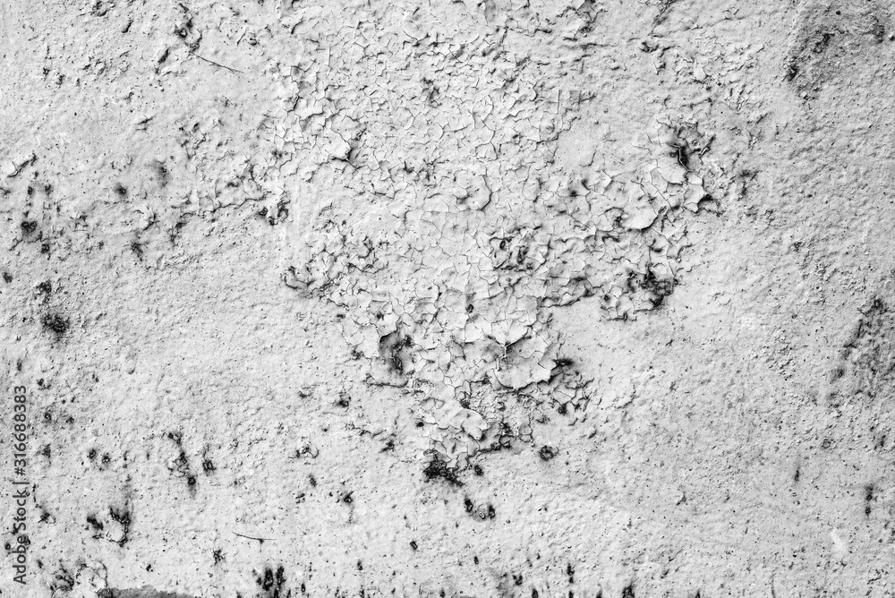 Texture of a metal wall with cracks and scratches which can be used as a background Texture of a metal wall with cracks and scratches which can be used as a background
