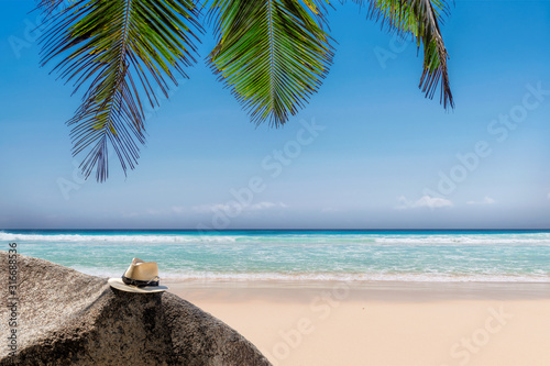 Tropical beach background. Summer vacation and tropical beach concept. © lucky-photo