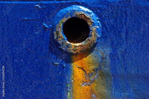 Bild auf Leinwand Scupper hole for water drainage water from main deck of the cargo ship