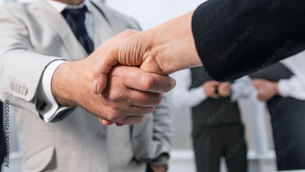 business shaking hands before the talks. the concept of cooperation