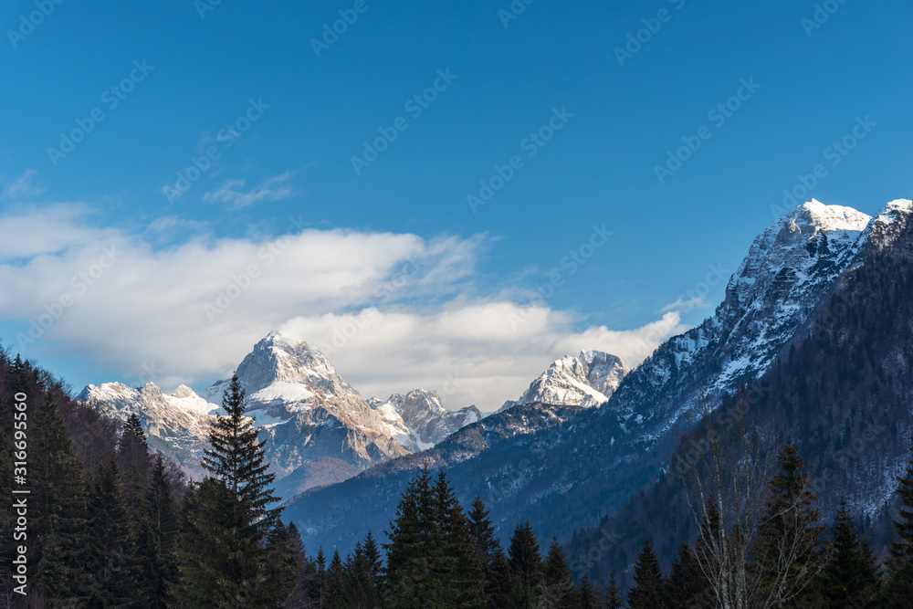 Mount Mangart from the Predil pass in winter clothes. Tarvisio, Italy