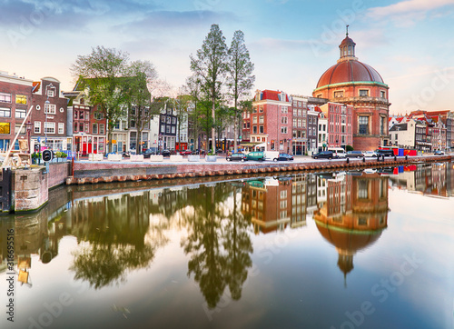 Amsterdam Canal houses at sunset reflections, Netherlands