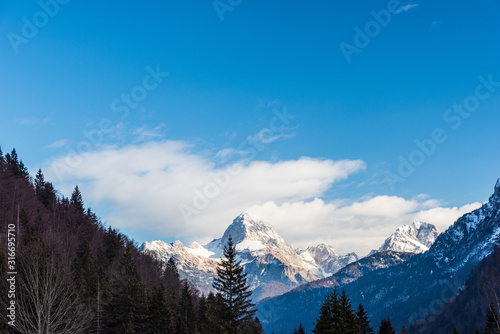 Mount Mangart from the Predil pass in winter clothes. Tarvisio, Italy